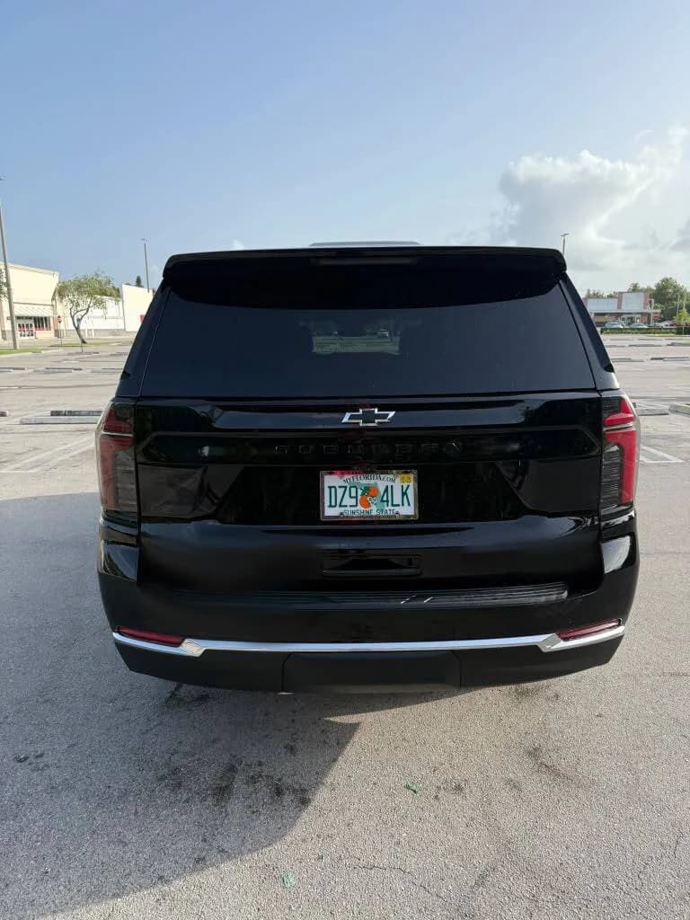 Black Chevrolet Suburban on standby for an hourly chauffeur booking in Miami